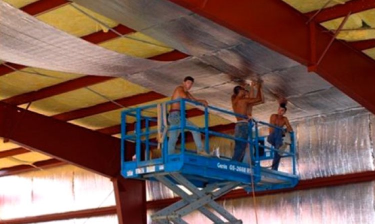Figure 8: Reflective insulation being applied in a commercial building in Costa Rica. Source: Prodex, Costa Rica.