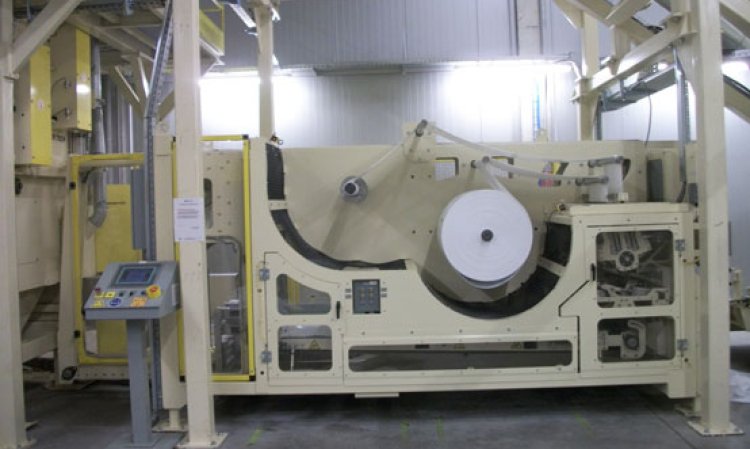 The model HAT-150-E bag placer/sealer's roll of tubular film accepts a replacement roll of film during operation, enhancing uptime and an output of up to 3bpm.
